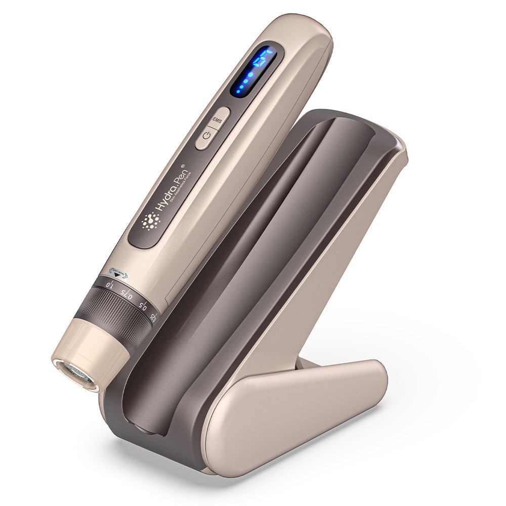 Penna Hydra H5 in oro champagne con cartuccia, cappuccio protettivo e base abbinata
